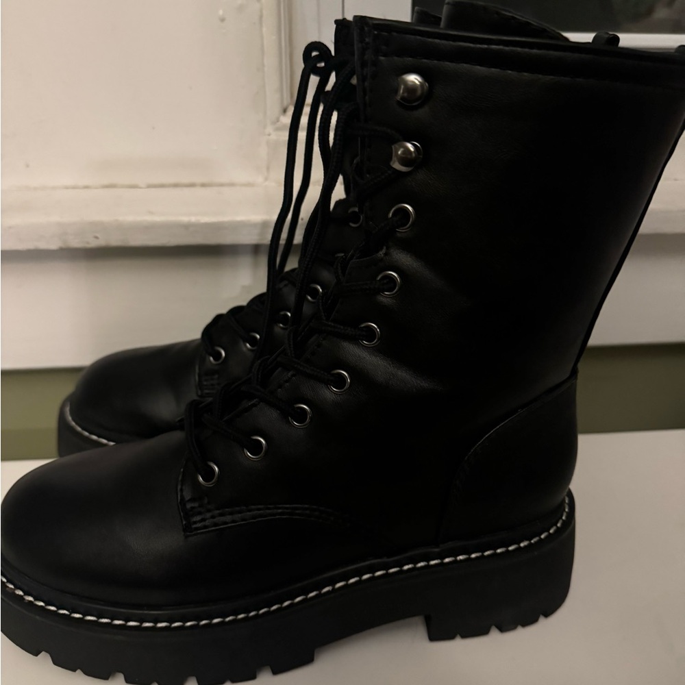A new day black boots